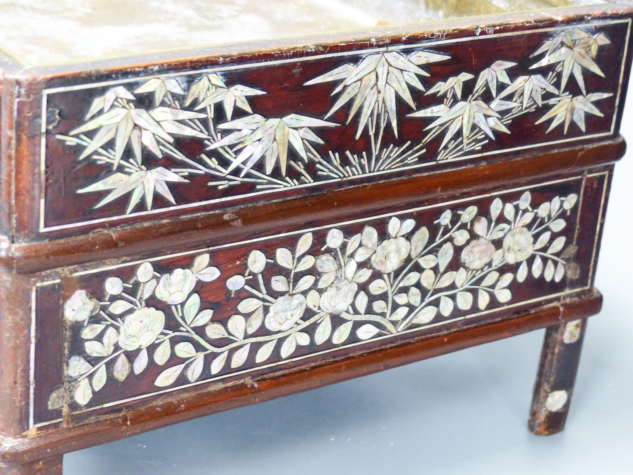 A 19th century Korean lacquered wood stove with mother of pearl inlay 38cm